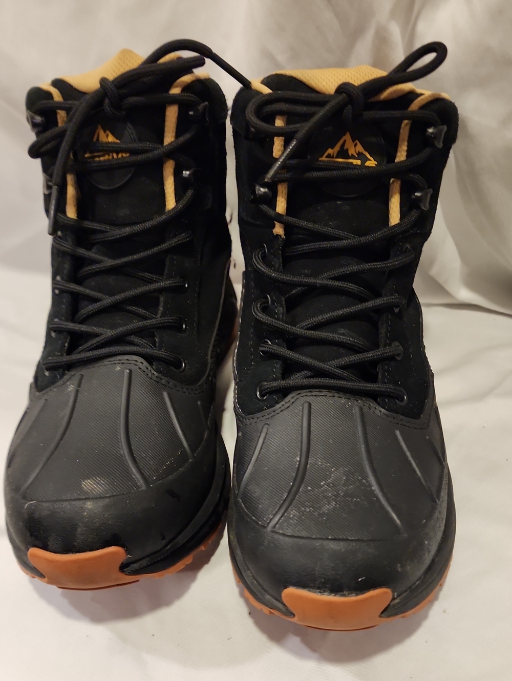 NORTIV 8 Women's Waterproof Hiking Boots With a black upper with a rubber sole